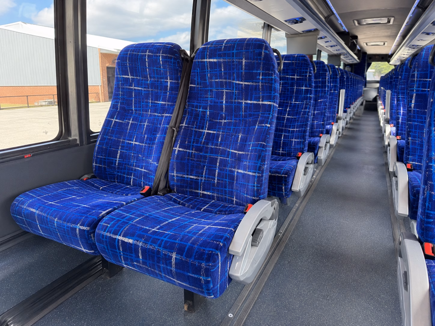 charter bus shuttles between logan and hill air force base